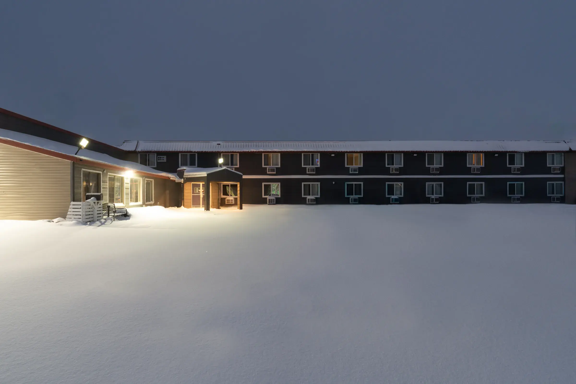 The inn glowing in the evening